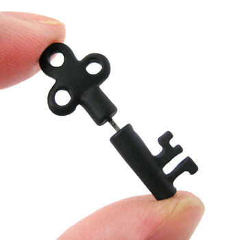 Fake Gauge Earrings: Skeleton Key Shaped Faux Plug Stud Earrings in Black | DOTOLY