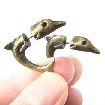 Fake Gauge Earrings: Small Dolphin Sea Animal Shaped Plug Stud Earrings in Brass | DOTOLY