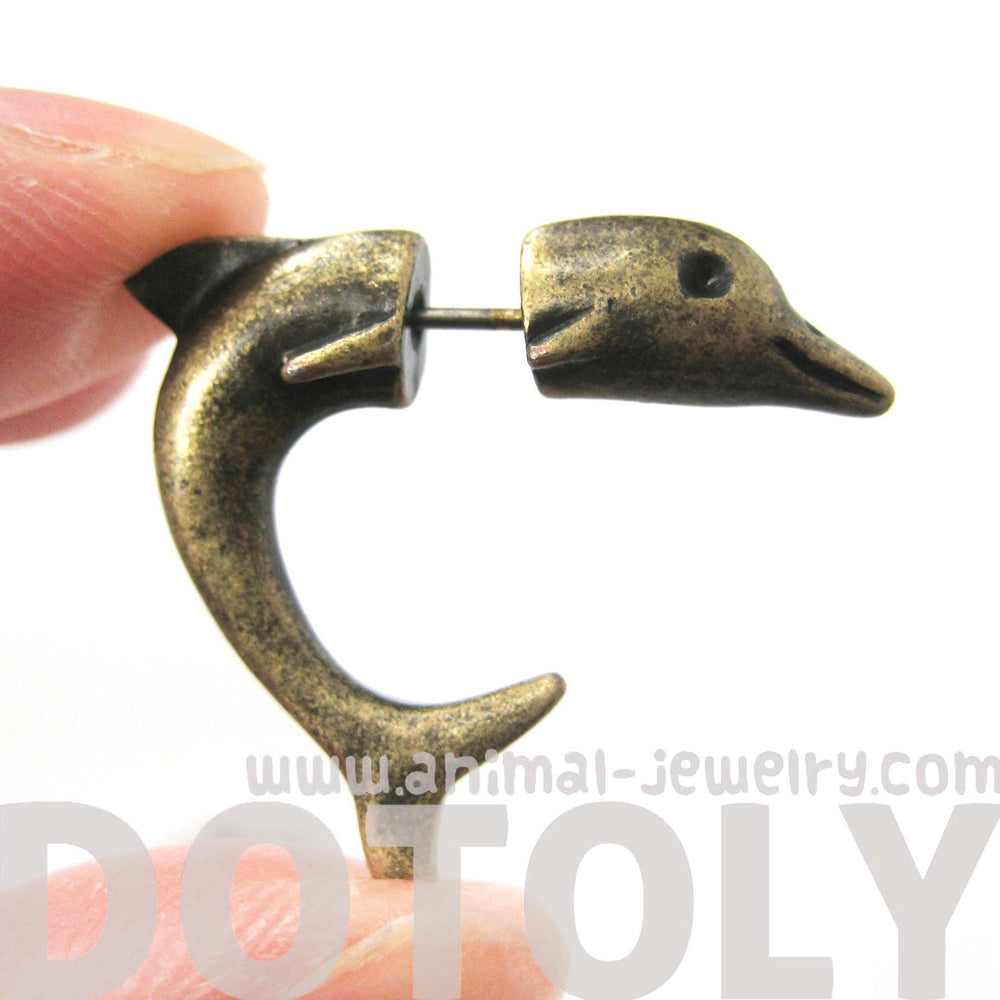 Fake Gauge Earrings: Small Dolphin Sea Animal Shaped Plug Stud Earrings in Brass | DOTOLY