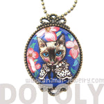 Fancy Kitty Cat Shaped Illustrated Oval Pendant Necklace in Blue with Roses | DOTOLY
