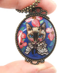 Fancy Kitty Cat Shaped Illustrated Oval Pendant Necklace in Blue with Roses | DOTOLY