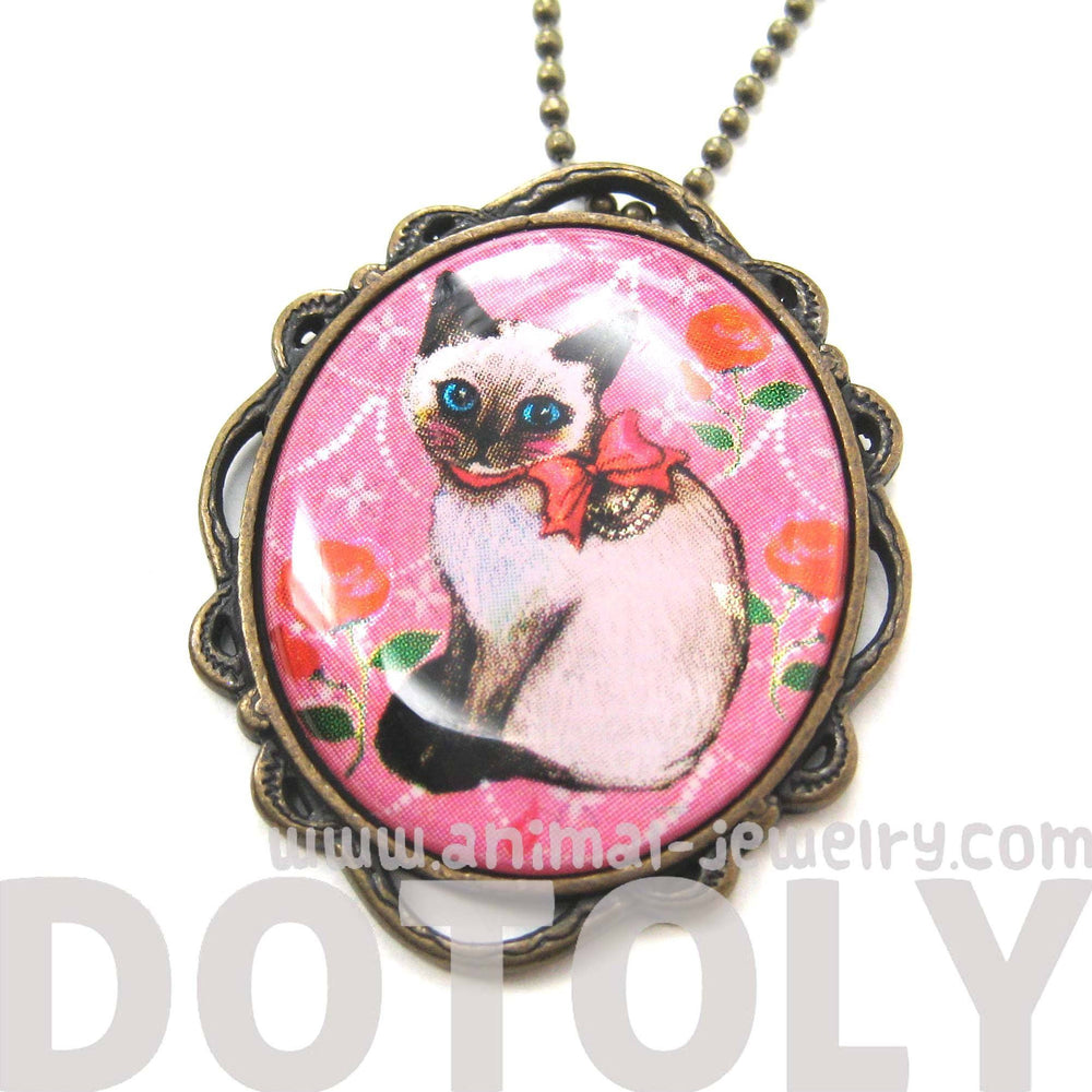 Fancy Siamese Kitty Cat Shaped Illustrated Oval Pendant Necklace in Pink with Bows and Roses | DOTOLY