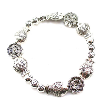 Fishes and Flowers Shaped Beaded Charm Stretchy Bracelet in Silver | DOTOLY | DOTOLY