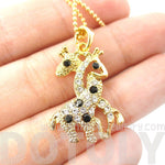 Giraffes with Necks Entwined Animal Shaped Pendant Necklace in Gold with Rhinestones | DOTOLY