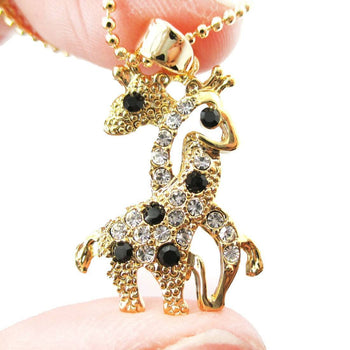 Giraffes with Necks Entwined Animal Shaped Pendant Necklace in Gold with Rhinestones | DOTOLY