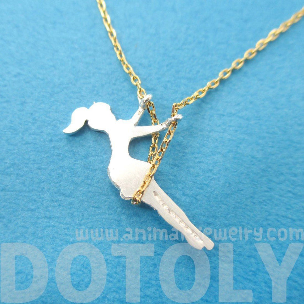 Girl Swinging on a Swing Acrobat Charm Necklace in Gold and Silver | DOTOLY | DOTOLY
