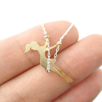 Girl Swinging on a Swing Acrobat Charm Necklace in Silver and Gold | DOTOLY | DOTOLY