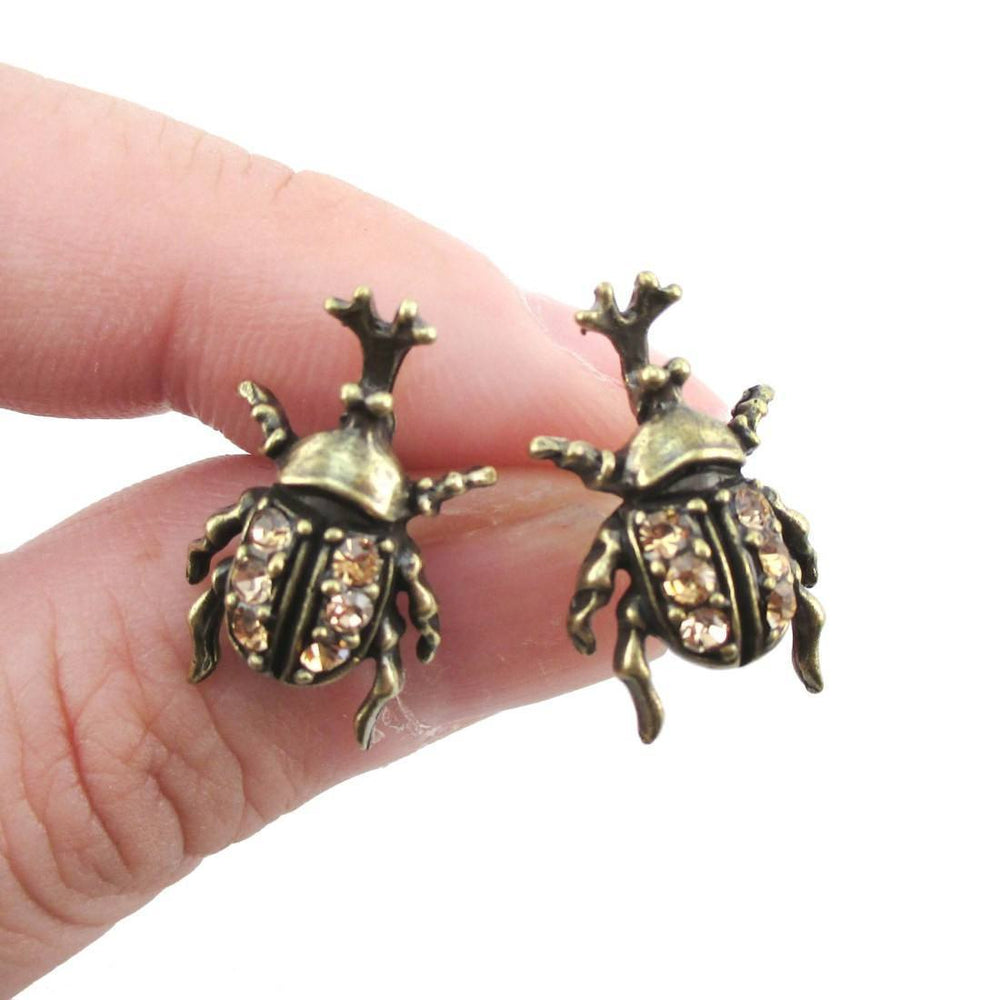 Hercules Rhino Beetle Shaped Rhinestone Stud Earrings in Brass | DOTOLY | DOTOLY
