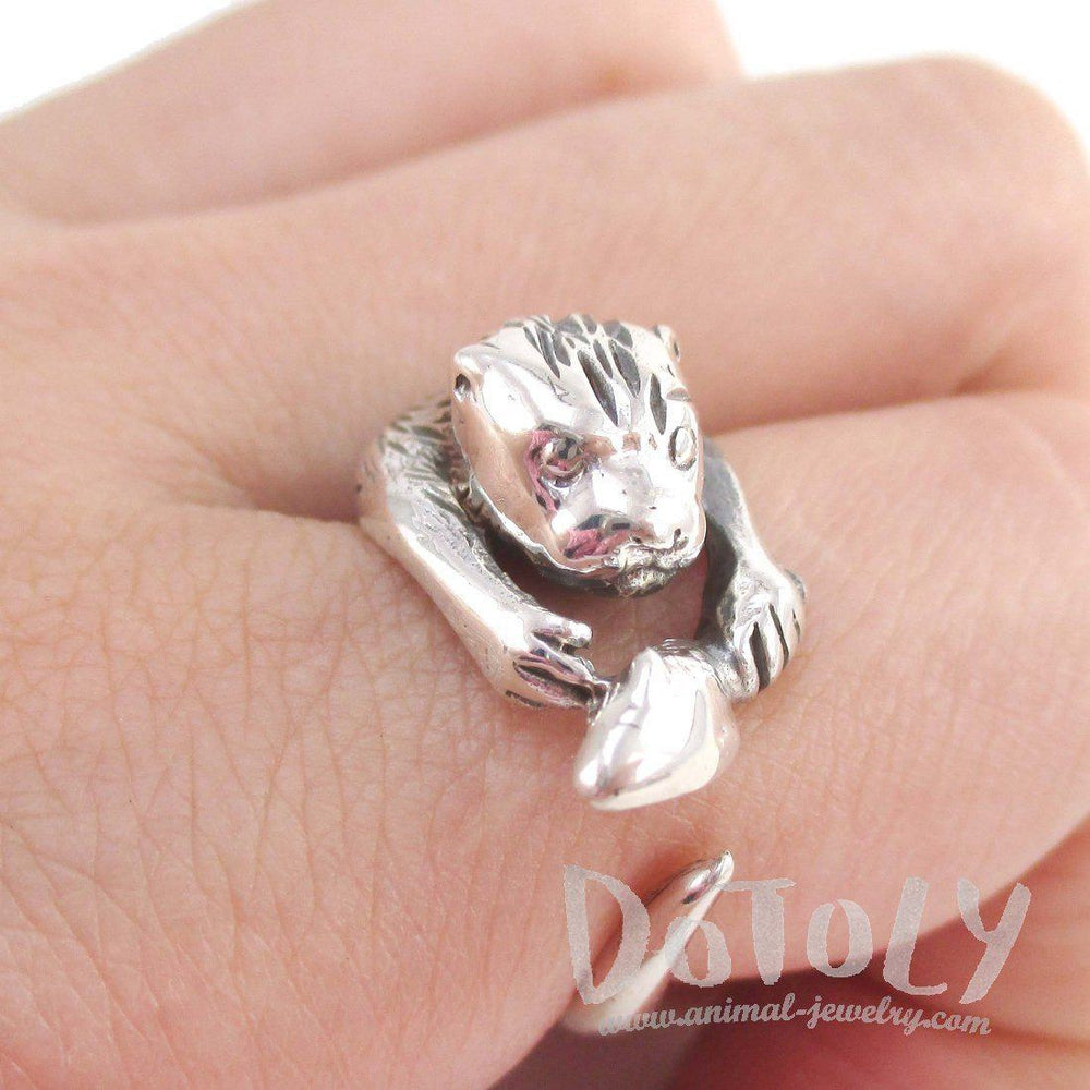 Holding a Fish Shaped Animal Wrap Around Ring in 925 Sterling Silver