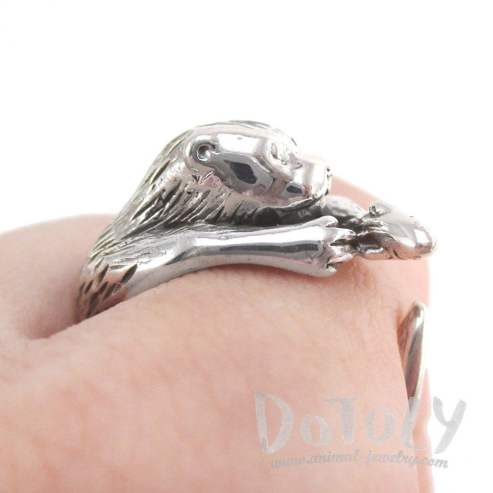 Holding a Fish Shaped Animal Wrap Around Ring in 925 Sterling Silver