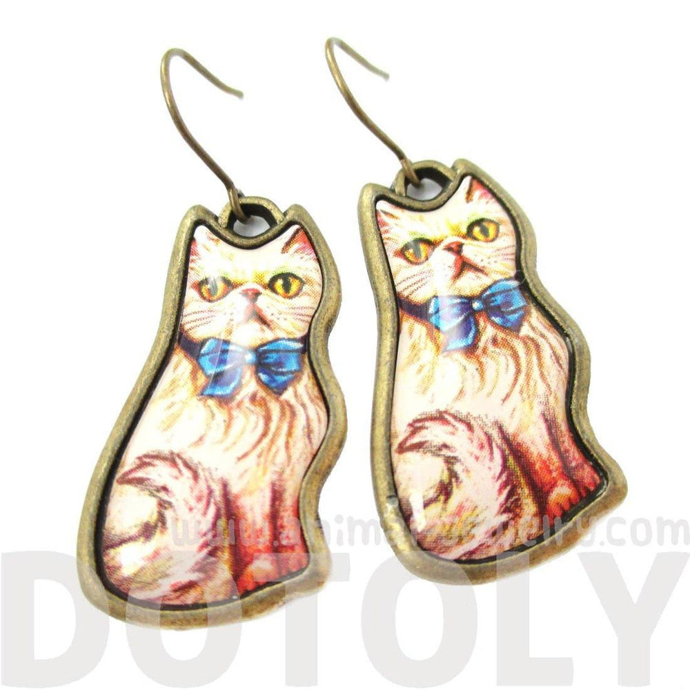Illustrated Fancy Kitty Cat Animal Dangle Earrings in White with Blue Bow | DOTOLY | DOTOLY