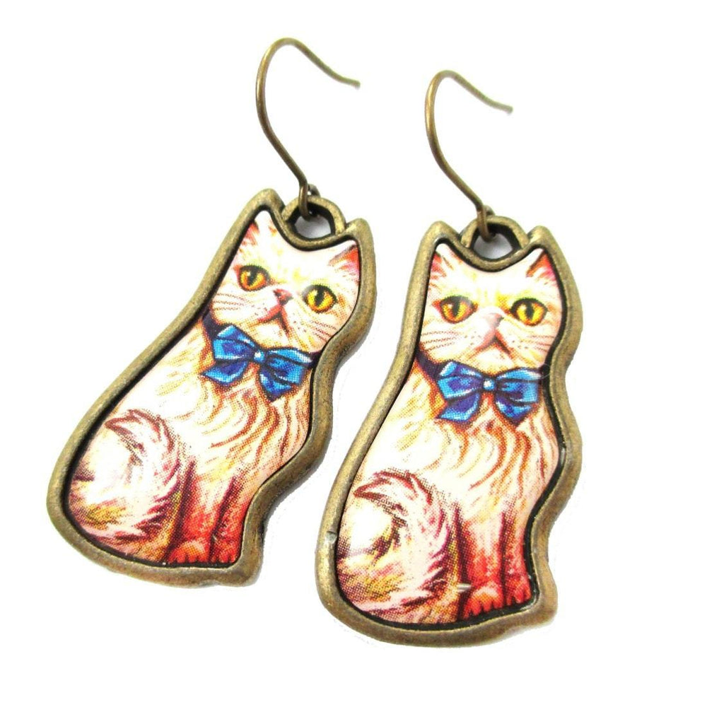 Illustrated Fancy Kitty Cat Animal Dangle Earrings in White with Blue Bow | DOTOLY | DOTOLY