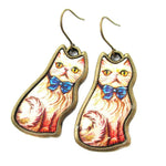 Illustrated Fancy Kitty Cat Animal Dangle Earrings in White with Blue Bow | DOTOLY | DOTOLY