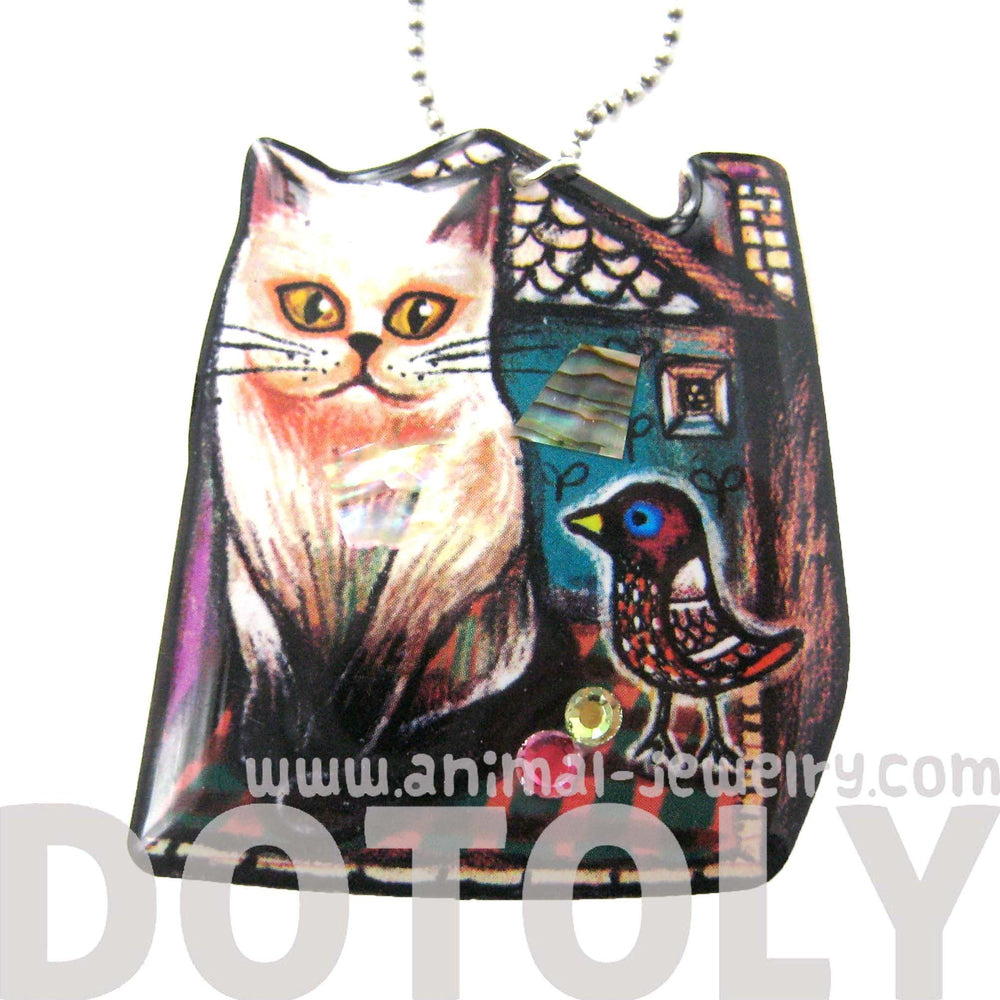 Kitty Cat in Front of A House with a Bird Shaped Illustrated Resin Pendant Necklace | DOTOLY