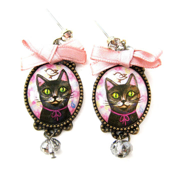 Kitty Cat Portrait Illustrated Drop Stud Earrings in Black with Bows | Animal Jewelry | DOTOLY