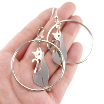 Kitty Cat Silhouette Shaped Dangle Hoop Earrings in Silver | Animal Jewelry | DOTOLY