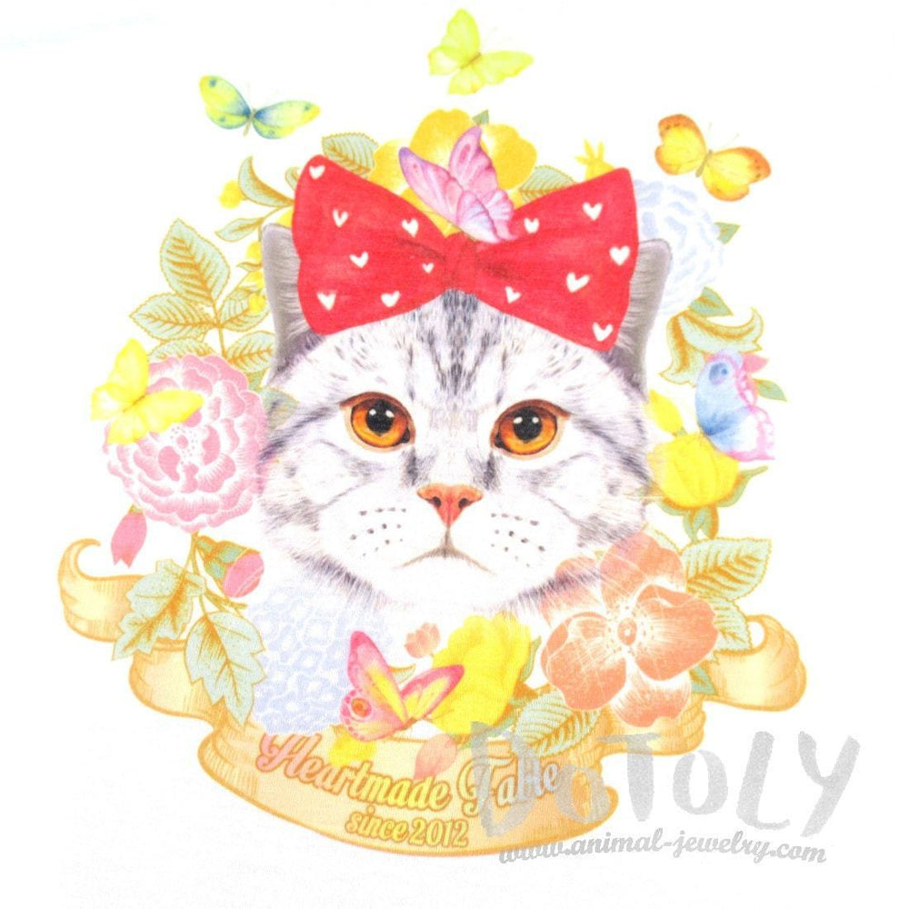Kitty Cat Surrounded by Flowers and Butterflies Graphic Print Tee T-Shirt for Women | DOTOLY