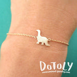 Long Neck Dinosaur Sauropoda Silhouette Shaped Charm Bracelet in Rose Gold | DOTOLY