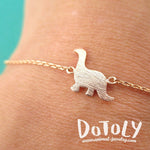 Long Neck Dinosaur Sauropoda Silhouette Shaped Charm Bracelet in Rose Gold | DOTOLY