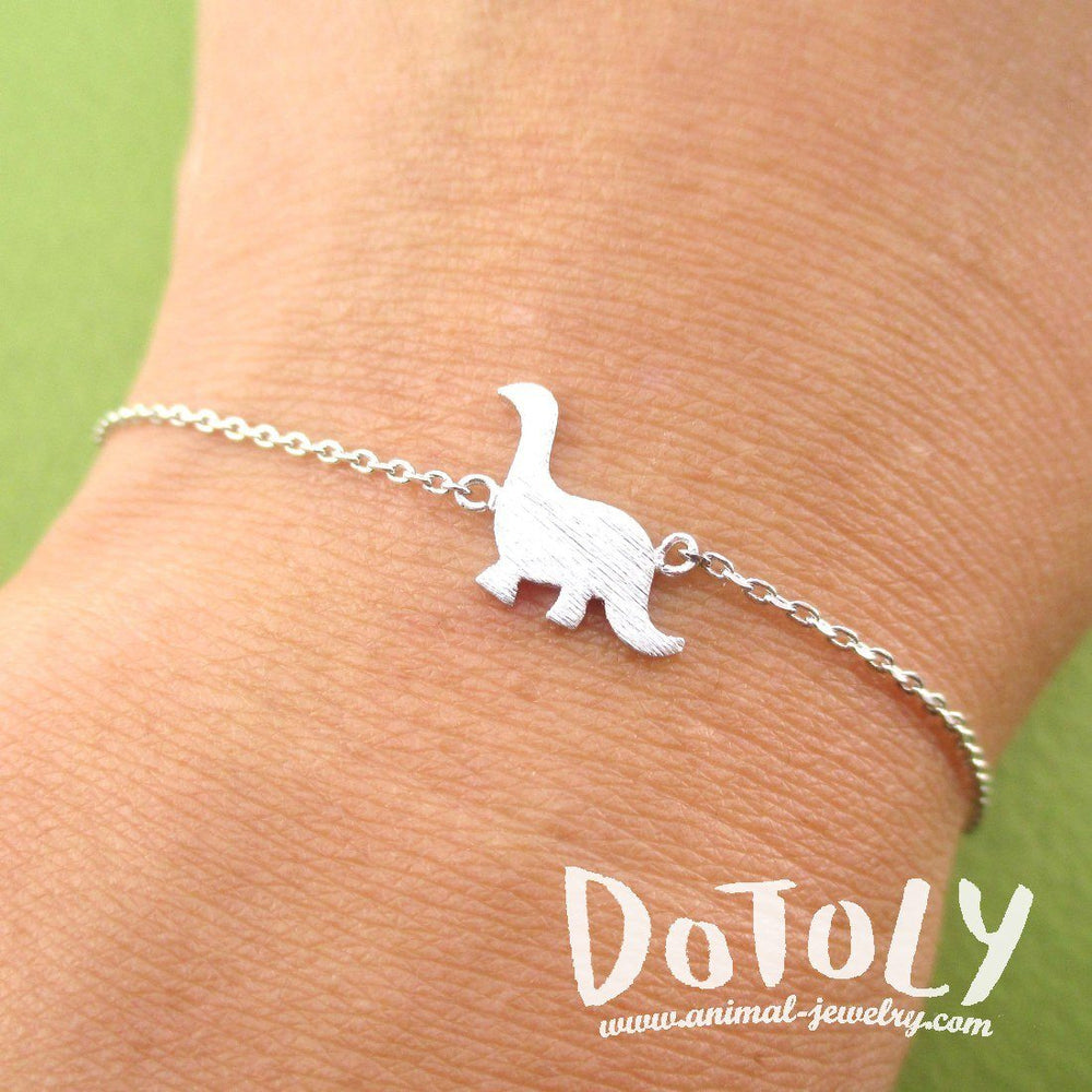 Long Neck Dinosaur Sauropoda Silhouette Shaped Charm Bracelet in Silver | DOTOLY