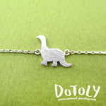 Long Neck Dinosaur Sauropoda Silhouette Shaped Charm Bracelet in Silver | DOTOLY