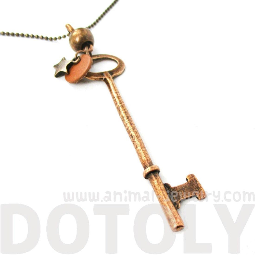 Long Skeleton Key and Star Shaped Pendant Necklace in Brass | DOTOLY | DOTOLY