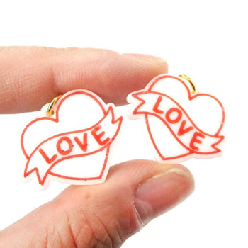Love Banner Tattoo Heart Shaped Laser Cut Dangle Clip On Earrings in White | DOTOLY
