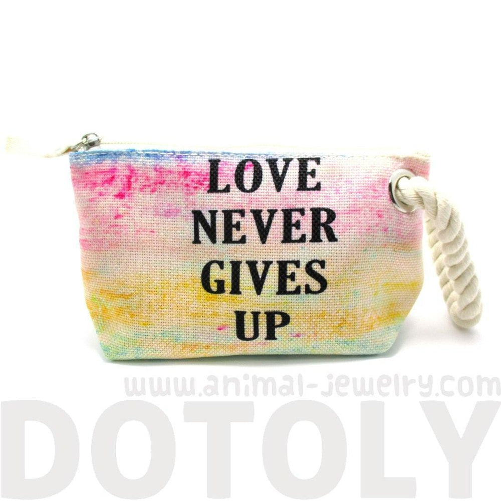 Love Never Gives Up Rainbow Watercolor Fabric Clutch Make Up Bag | DOTOLY | DOTOLY