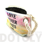 Love Never Gives Up Rainbow Watercolor Fabric Clutch Make Up Bag | DOTOLY | DOTOLY