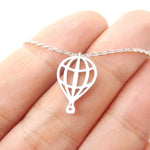 Miniature Hot Air Balloon Shaped Cut Out Charm Necklace in Silver | DOTOLY | DOTOLY