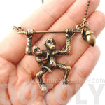 Mother and Baby Chimpanzee Monkey Swinging Shaped Animal Pendant Necklace in Bronze | DOTOLY