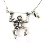 Mother and Baby Chimpanzee Monkey Swinging Shaped Animal Pendant Necklace in Silver | DOTOLY