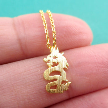 Mythical Dragon Silhouette Shaped Pendant Necklace in Gold | DOTOLY