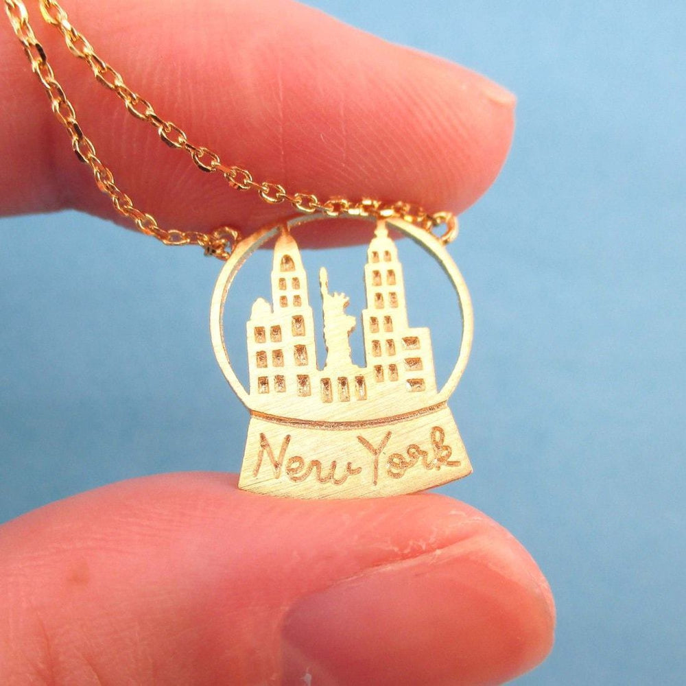 New York Skyline Snow Globe Pendant Necklace in Gold | DOTOLY | DOTOLY