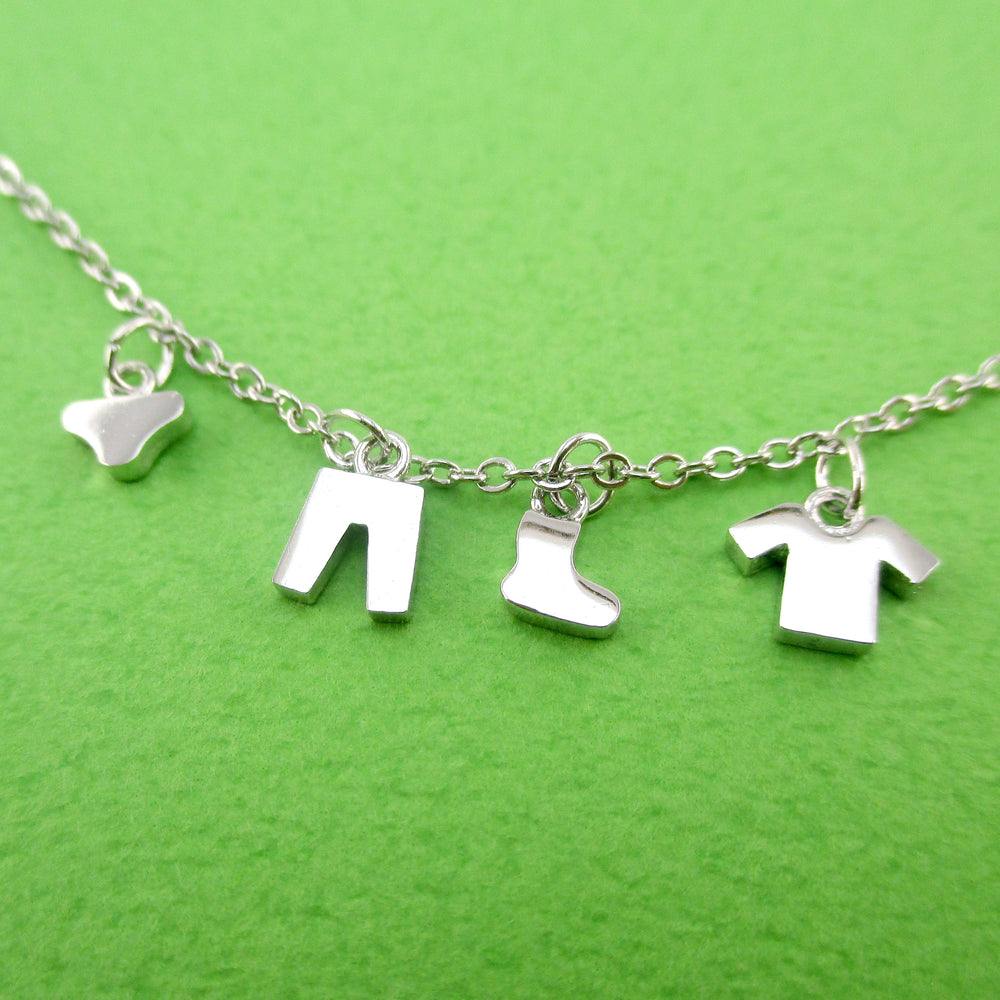 No More Dirty Laundry Clothing Line Charm Necklace in Silver | DOTOLY