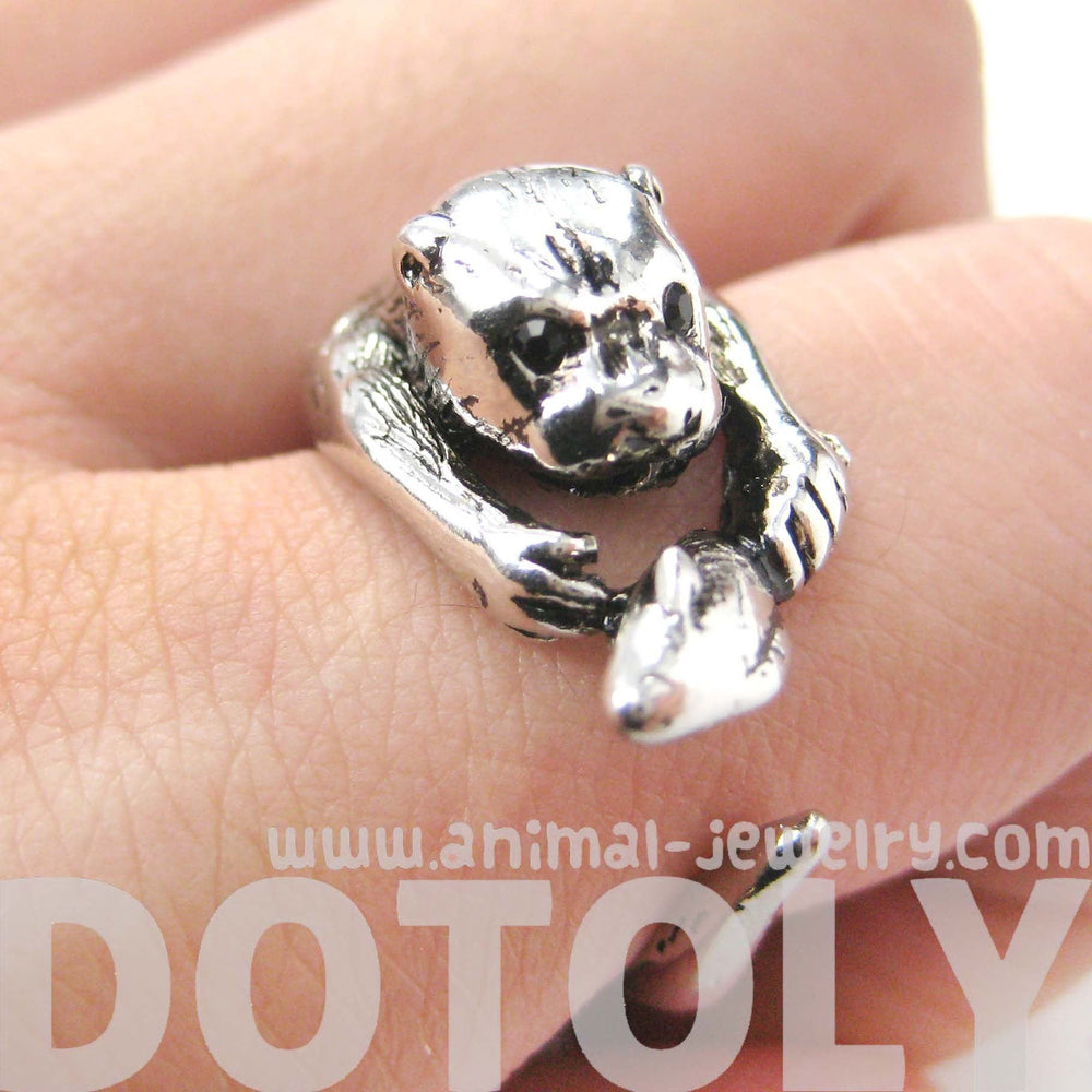Otter Holding a Fish Shaped Animal Wrap Around Ring in Shiny Silver | US Sizes 4 to 9 | DOTOLY