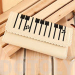 Piano Keyboard Musical Notes Shaped Bi Fold Clutch Long Wallet for Women in Cream | DOTOLY