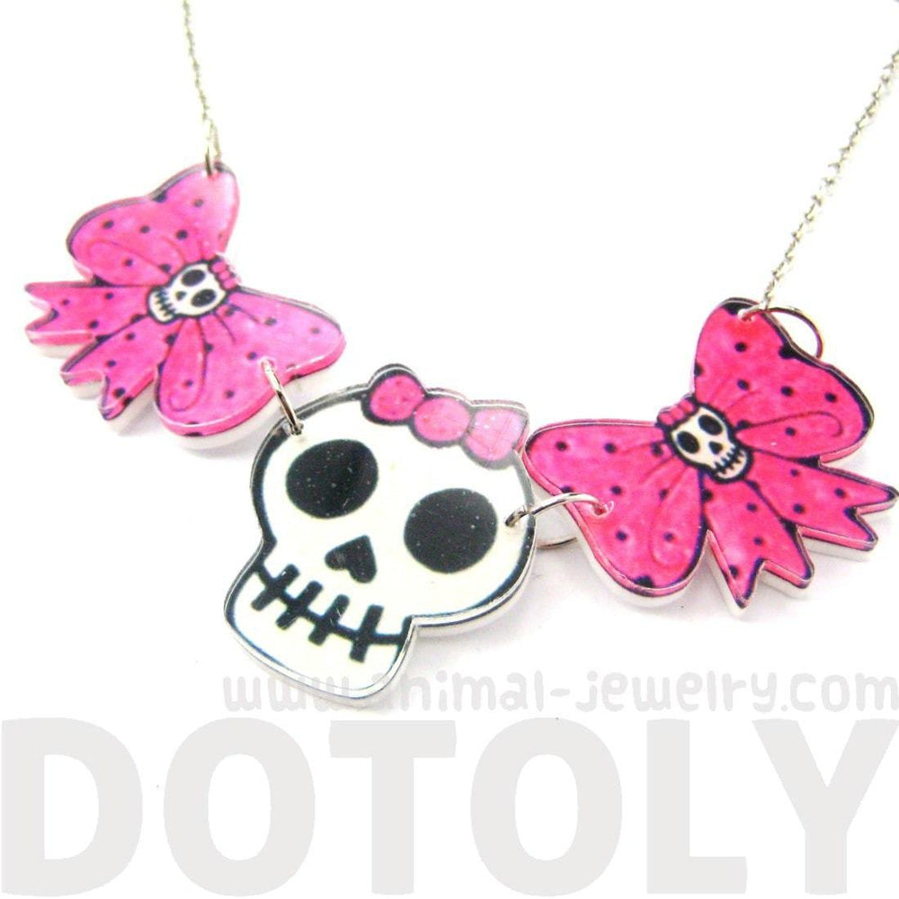 Pink Polka Dot Bow and Skeleton Skull Shaped Acrylic Illustrated Pendant Necklace | DOTOLY