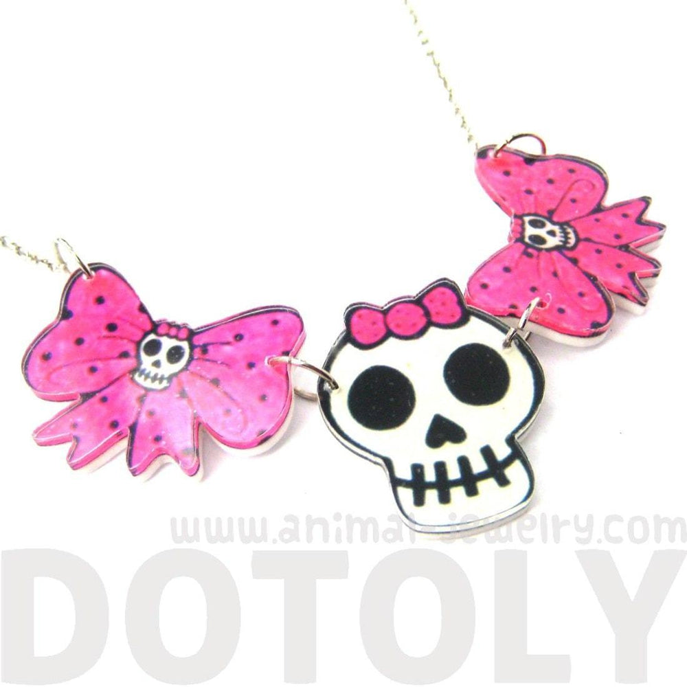 Pink Polka Dot Bow and Skeleton Skull Shaped Acrylic Illustrated Pendant Necklace | DOTOLY