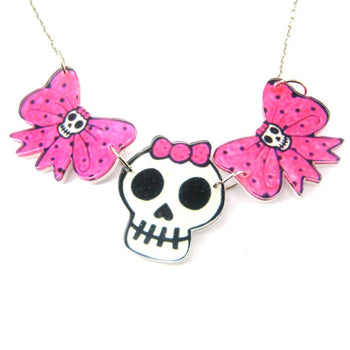 Pink Polka Dot Bow and Skeleton Skull Shaped Acrylic Illustrated Pendant Necklace | DOTOLY