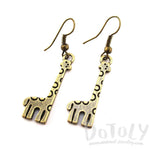 Polka Dotted Giraffe Shaped Dangle Charm Earrings in Brass | DOTOLY