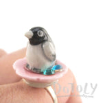 Porcelain Baby Penguin on a Flower Petal Shaped Adjustable Animal Ring