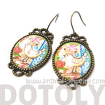 Pretty Oval Dove Bird Illustrated Resin Dangle Earrings | Animal Jewelry | DOTOLY