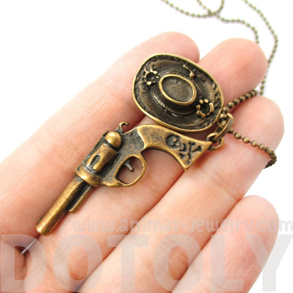 Realistic Gun Pistol Revolver and Cowboy Hat Shaped Pendant Necklace in Bronze | DOTOLY | DOTOLY