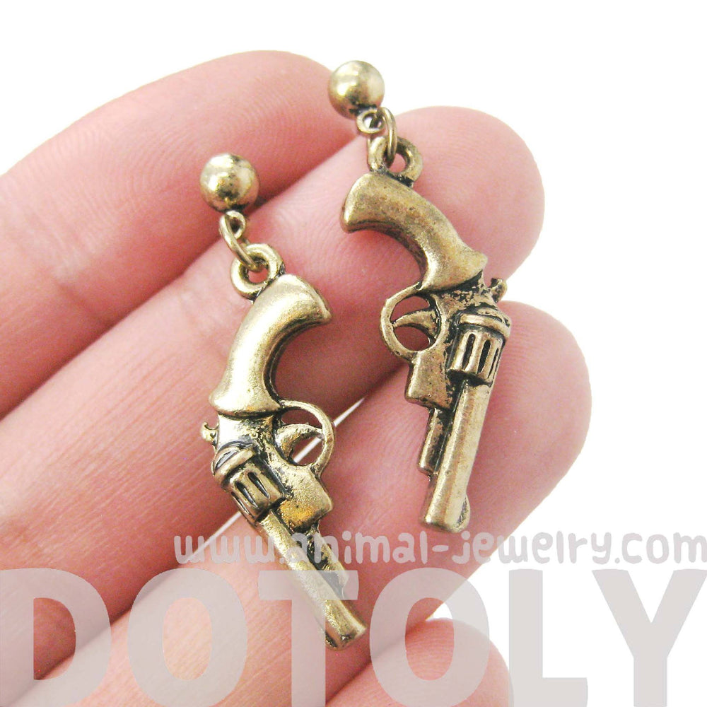 Realistic Gun Pistol Revolver Shaped Dangle Drop Stud Earrings in Brass | DOTOLY