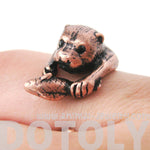 Realistic Otter Holding a Fish Shaped Animal Wrap Ring in Copper | US Sizes 4 to 9 | DOTOLY