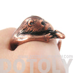 Realistic Otter Holding a Fish Shaped Animal Wrap Ring in Copper | US Sizes 4 to 9 | DOTOLY