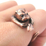 Realistic Otter Holding a Fish Shaped Animal Wrap Ring in Copper | US Sizes 4 to 9 | DOTOLY