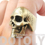 realistic-skull-skeleton-shaped-unisex-ring-with-tattoo-details-in-brass-dotoly