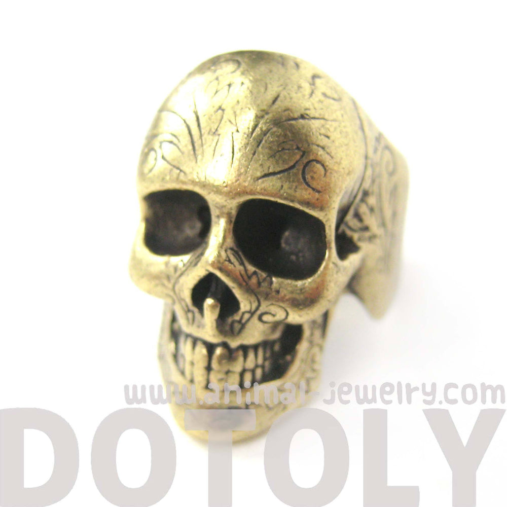 realistic-skull-skeleton-shaped-unisex-ring-with-tattoo-details-in-brass-dotoly